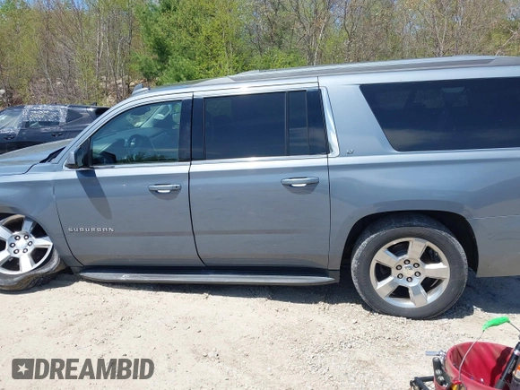 2016 Chevrolet Suburban LT z VIN 1GNSKHKC4GR427591, wystawiony jako IAAI lot #42162723 z przebiegiem 131 771 mil mil oraz . Historia ofert i sprzedaży dostępna na DreamBid. Obrazek 14.