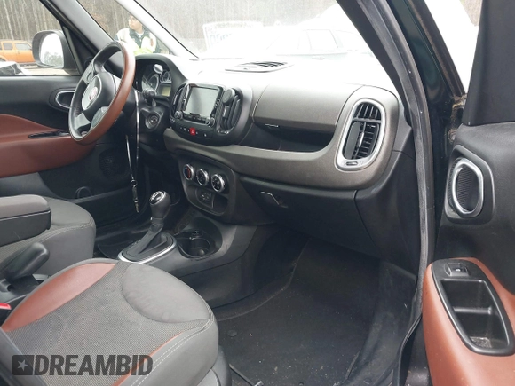 2014 FIAT 500L Trekking with VIN ZFBCFADH5EZ017349, listed as a IAAI auction lot 41528462 with 119,820 mi miles and . Bid and sale history available at DreamBid. Image 5.