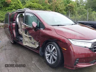 2021 Honda Odyssey Touring with VIN 5FNRL6H88MB006938, listed as a IAAI auction lot 42367022 with 63,280 mi miles and . Bid and sale history available at DreamBid. Image 6.