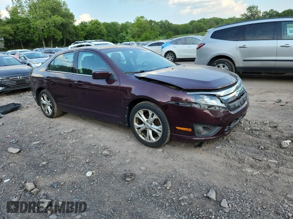 2012 Ford Fusion SE z VIN 3FAHP0HA7CR387524, wystawiony jako Copart lot #62083235 z przebiegiem 104 698 mil mil oraz Szkoda całkowita • Salvage title. Historia ofert i sprzedaży dostępna na DreamBid. Obrazek 4.