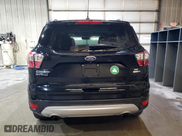 2018 Ford Escape SE z VIN 1FMCU9GD7JUD46213, wystawiony jako Copart lot #45981125 z przebiegiem 95 242 mil mil oraz Czysty tytuł • Clean title. Historia ofert i sprzedaży dostępna na DreamBid. Obrazek 6.