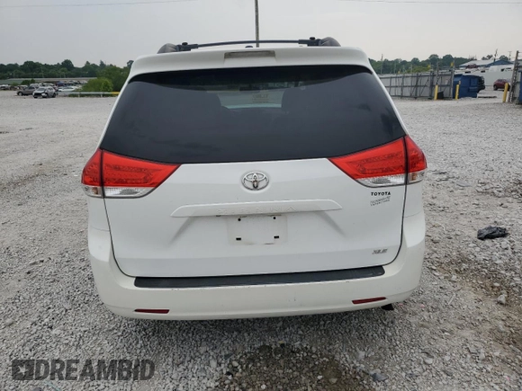 2012 Toyota Sienna XLE AAS с VIN 5TDYK3DC7CS207716, выставлен на аукционе Copart как лот 60592265 с пробегом 287 021 миль миль и Списание • Salvage title. История ставок и продаж доступна на DreamBid. Изображение 6.