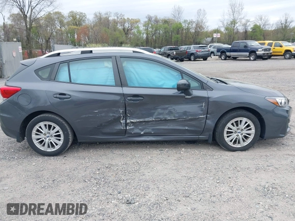 2018 Subaru Impreza Premium z VIN 4S3GTAD61J3703780, wystawiony jako IAAI lot #42081604 z przebiegiem 79 757 mil mil oraz . Historia ofert i sprzedaży dostępna na DreamBid. Obrazek 13.