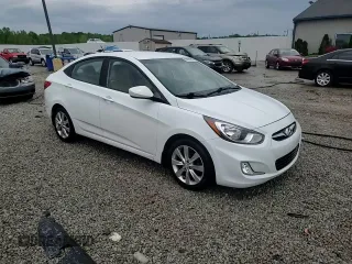 2012 Hyundai Accent GLS z VIN KMHCU4AE9CU243155, wystawiony jako Copart lot #53612565 z przebiegiem 97 636 mil mil oraz Nie do naprawy. Historia ofert i sprzedaży dostępna na DreamBid. Obrazek 13.