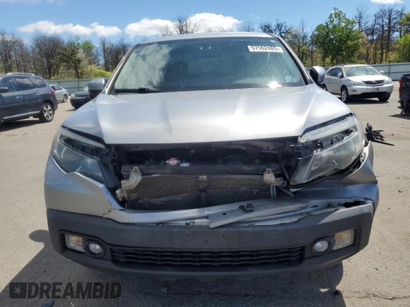 2017 Honda Ridgeline RTL-T with VIN 5FPYK3F65HB012868, listed as a Copart auction lot 57562885 with 115,530 mi miles and Salvage title. Bid and sale history available at DreamBid. Image 5.