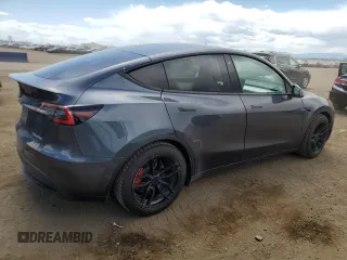 2021 Tesla Model Y Performance with VIN 5YJYGDEF0MF137692, listed as a Copart auction lot 55333395 with 56,325 mi miles and Salvage Title. Bid and sale history available at DreamBid. Image 3.