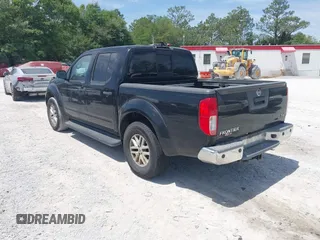 2014 Nissan Frontier SV with VIN 1N6AD0ER8EN725739, listed as a IAAI auction lot 42081008 with 279,407 mi miles and . Bid and sale history available at DreamBid. Image 3.