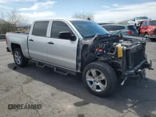 2018 Chevrolet Silverado 1500 Custom with VIN 3GCPCPEH0JG134579, listed as a Copart auction lot 50581845 with 125,133 mi miles and Salvage Title. Bid and sale history available at DreamBid. Image 4.