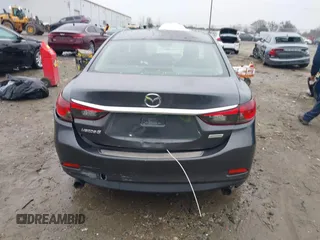 2016 Mazda Mazda6 i Touring with VIN JM1GJ1V56G1462637, listed as a IAAI auction lot 41603296 with 143,931 mi miles. Bid and sale history available at carsss.com. Image 16.
