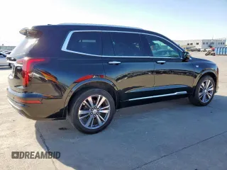 2020 Cadillac XT6 FWD Premium Luxury z VIN 1GYKPCRS7LZ131298, wystawiony jako Copart lot #50196605 z przebiegiem 63 320 mil mil oraz Czysty tytuł • Clean title. Historia ofert i sprzedaży dostępna na DreamBid. Obrazek 3.