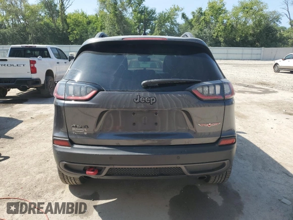 2019 Jeep Cherokee Trailhawk with VIN 1C4PJMBX0KD361639, listed as a Copart auction lot 60549865 with 95,888 mi miles and Salvage title. Bid and sale history available at DreamBid. Image 6.