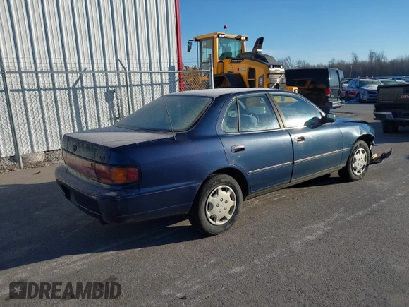 1994 Toyota Camry LE with VIN 4T1SK12EXRU374215, listed as a IAAI auction lot 41581093 with 80,397 mi miles. Bid and sale history available at carsss.com. Image 4.