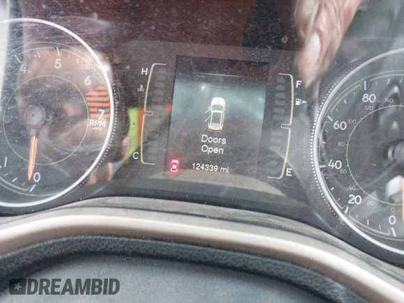 2017 Jeep Cherokee Sport with VIN 1C4PJLAB8HW527354, listed as a IAAI auction lot 41578066 with 124,339 mi miles. Bid and sale history available at carsss.com. Image 7.