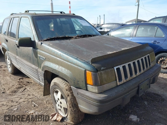 1993 Jeep Grand Cherokee Laredo with VIN 1J4GZ58S1PC680016, listed as a IAAI auction lot 41813392 with 149,520 mi miles. Bid and sale history available at carsss.com. Image 1.