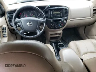 2001 Mazda Tribute LX with VIN 4F2CU08101KM11452, listed as a Copart auction lot 76796064 with 175,584 mi miles and Salvage Title. Bid and sale history available at DreamBid. Image 8.