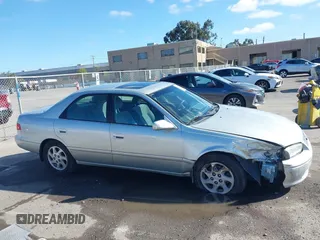 2001 Toyota Camry LE z VIN JT2BF22KX10342454, wystawiony jako IAAI lot #41939743 z przebiegiem 124 045 mil mil oraz . Historia ofert i sprzedaży dostępna na DreamBid. Obrazek 13.