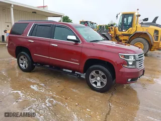 2017 Chevrolet Tahoe LT with VIN 1GNSKBKCXHR270034, listed as a IAAI auction lot 42036132 with 144,530 mi miles. Bid and sale history available at carsss.com. Image 1.