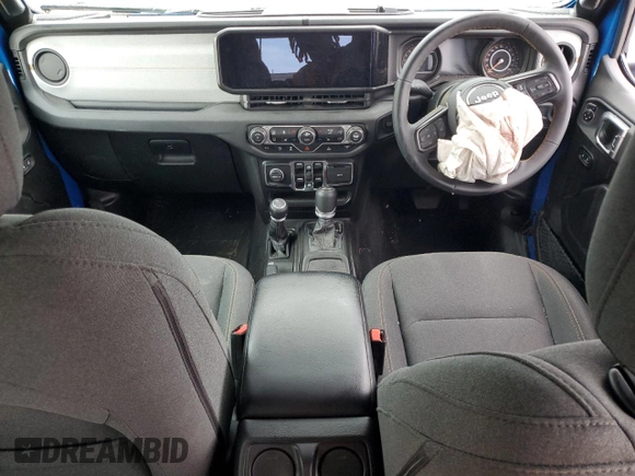 2024 Jeep Wrangler Sport with VIN 1C4PJXKN3RW236990, listed as a Copart auction lot 61449514 with 3,479 mi miles and Salvage title. Bid and sale history available at DreamBid. Image 8.