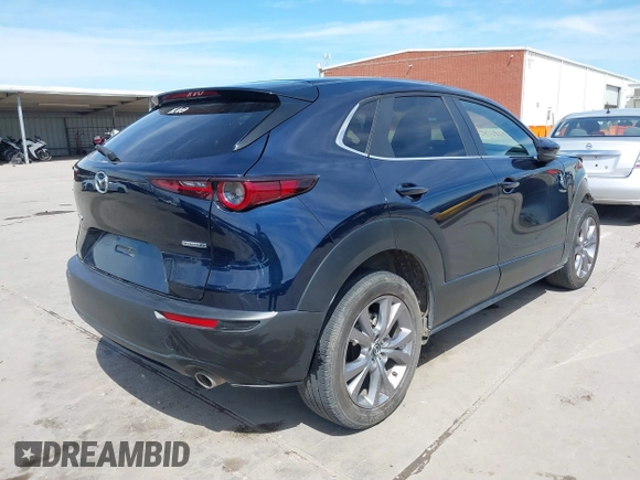 2021 Mazda CX-30 Select with VIN 3MVDMABL5MM272418, listed as a IAAI auction lot 41783355 with 25,429 mi miles and . Bid and sale history available at DreamBid. Image 4.