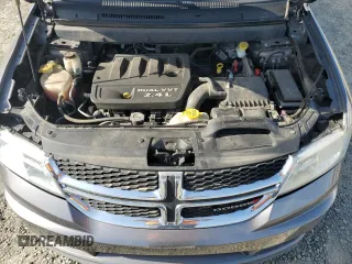 2013 Dodge Journey American Value with VIN 3C4PDCAB8DT590509, listed as a Copart auction lot 57347375 with 203,642 mi miles and Clean title. Bid and sale history available at DreamBid. Image 12.