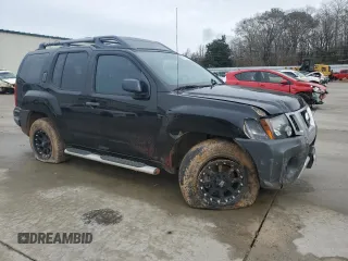 2015 Nissan Xterra S with VIN 5N1AN0NU1FN658659, listed as a Copart auction lot 41862315 with 95,944 mi miles and Salvage Title. Bid and sale history available at DreamBid. Image 4.