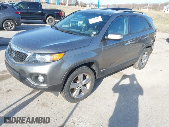 2012 Kia Sorento EX with VIN 5XYKUCA63CG300289, listed as a IAAI auction lot 41751407 with 141,310 mi miles. Bid and sale history available at carsss.com. Image 2.