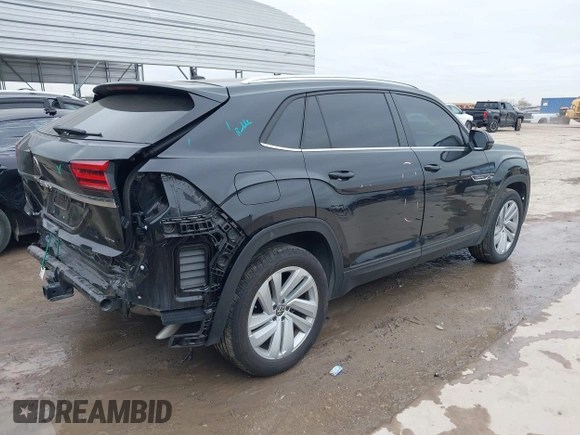 2023 Volkswagen Atlas SE z VIN 1V2KE2CA8PC225834, wystawiony jako IAAI lot #41330975 z przebiegiem 13 629 mil mil oraz . Historia ofert i sprzedaży dostępna na DreamBid. Obrazek 4.