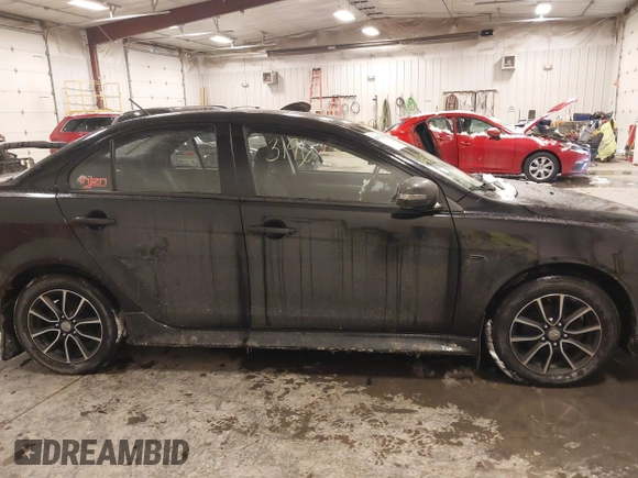 2015 Mitsubishi Lancer SE with VIN JA32V2FW6FU019508, listed as a IAAI auction lot 41633196 with 91,758 mi miles. Bid and sale history available at carsss.com. Image 13.