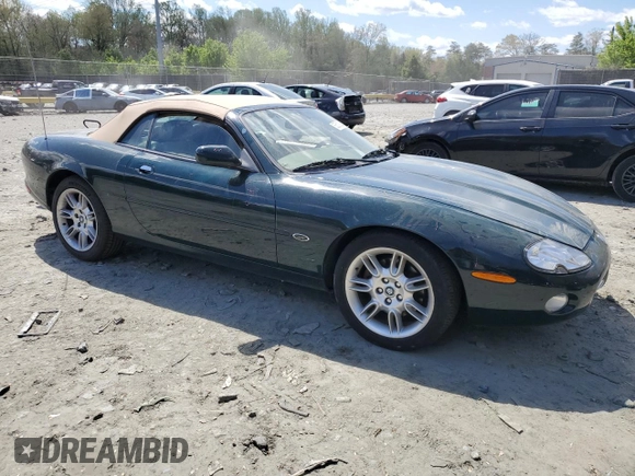 2002 Jaguar XK with VIN SAJDA42C22NA23724, listed as a Copart auction lot 53521005 with 61,468 mi miles and Salvage Title. Bid and sale history available at DreamBid. Image 4.