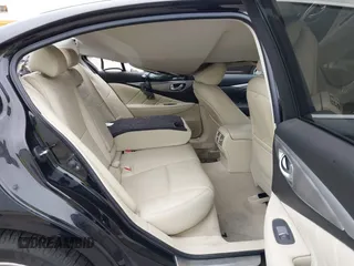 2015 Infiniti Q50 Premium with VIN JN1BV7AR8FM396828, listed as a IAAI auction lot 42313019 with 130,707 mi miles and . Bid and sale history available at DreamBid. Image 8.