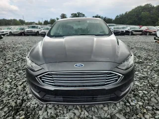 2017 Ford Fusion Hybrid SE with VIN 3FA6P0LU1HR269808, listed as a Copart auction lot 65921915 with 201,903 mi miles and Clean title. Bid and sale history available at DreamBid. Image 5.