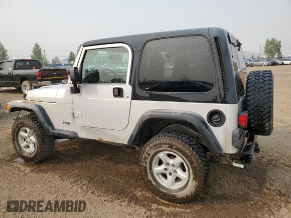 2003 Jeep Wrangler Sport z VIN 1J4FA49S93P306817, wystawiony jako Copart lot #60136385 z przebiegiem 217 208 mil mil oraz Czysty tytuł • Clean title. Historia ofert i sprzedaży dostępna na DreamBid. Obrazek 2.