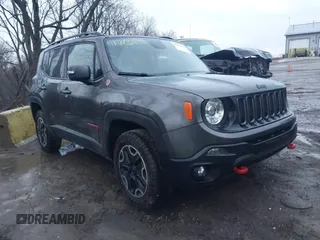 2017 Jeep Renegade Trailhawk z VIN ZACCJBCBXHPG13803, wystawiony jako IAAI lot #41723211 z przebiegiem 103 884 mil mil oraz . Historia ofert i sprzedaży dostępna na DreamBid. Obrazek 1.