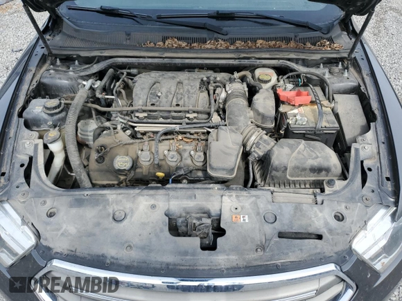 2015 Ford Taurus SEL z VIN 1FAHP2E89FG177287, wystawiony jako Copart lot #56074615 z przebiegiem 196 421 mil mil oraz Szkoda całkowita • Salvage title. Historia ofert i sprzedaży dostępna na DreamBid. Obrazek 11.
