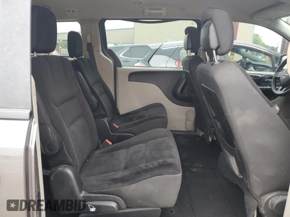 2019 Dodge Grand Caravan SE with VIN 2C4RDGBG0KR583936, listed as a Copart auction lot 53003875 with 299,602 mi miles and Clean Title. Bid and sale history available at DreamBid. Image 11.