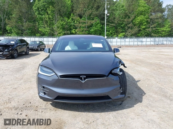 2017 Tesla Model X 90D z VIN 5YJXCBE20HF070235, wystawiony jako IAAI lot #42099344 z przebiegiem 57 686 mil mil oraz . Historia ofert i sprzedaży dostępna na DreamBid. Obrazek 13.