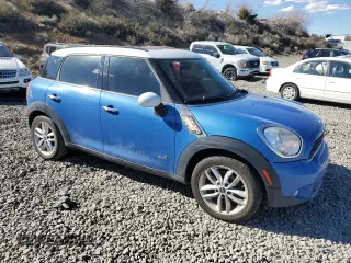 2012 MINI Countryman S with VIN WMWZC5C54CWL57389, listed as a Copart auction lot 49773945 with 120,889 mi miles and Salvage title. Bid and sale history available at DreamBid. Image 4.