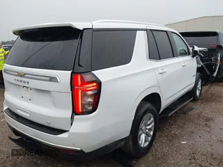 2024 Chevrolet Tahoe LT with VIN 1GNSCNKD8RR279520, listed as a IAAI auction lot 42494747 with 29,020 mi miles and . Bid and sale history available at DreamBid. Image 4.