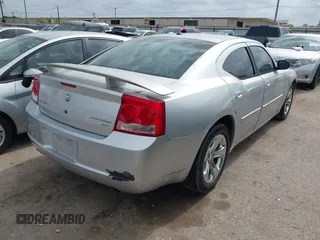 2010 Dodge Charger SXT with VIN 2B3CA3CV7AH292957, listed as a IAAI auction lot 42130665 with 253,598 mi miles and . Bid and sale history available at DreamBid. Image 4.