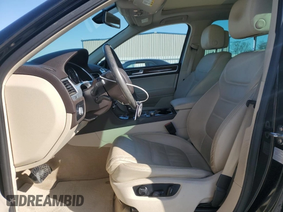 2012 Volkswagen Touareg Sport с VIN WVGEF9BP5CD011457, выставлен на аукционе Copart как лот 46785645 с пробегом 108 840 миль миль и Списание • Salvage title. История ставок и продаж доступна на DreamBid. Изображение 7.
