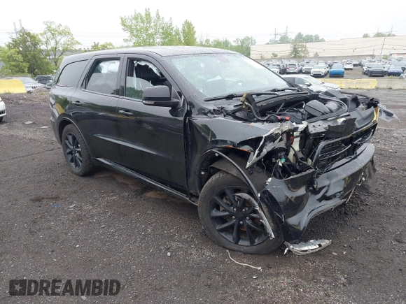 2017 Dodge Durango R/T with VIN 1C4SDJCTXHC878876, listed as a IAAI auction lot 42175360 with 61,323 mi miles and . Bid and sale history available at carsss.com. Image 1.