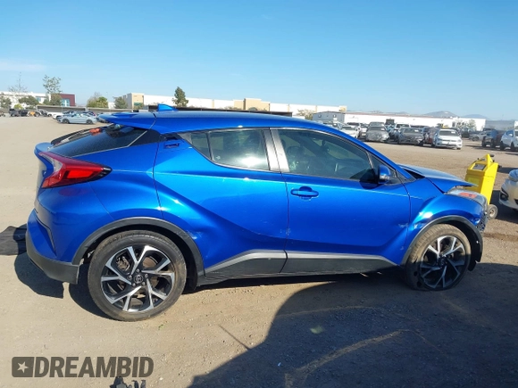 2018 Toyota C-HR XLE z VIN NMTKHMBXXJR007134, wystawiony jako IAAI lot #42004283 z przebiegiem 174 336 mil mil oraz . Historia ofert i sprzedaży dostępna na DreamBid. Obrazek 14.