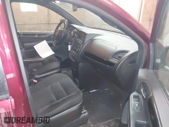 2019 Dodge Grand Caravan SE with VIN 2C4RDGBG6KR502910, listed as a IAAI auction lot 41395445 with 144,238 mi miles and . Bid and sale history available at DreamBid. Image 5.