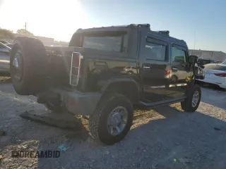 2005 Hummer H2 SUT with VIN 5GRGN22U85H109003, listed as a Copart auction lot 76557734 with 115,249 mi miles and Salvage Title. Bid and sale history available at carsss.com. Image 3.