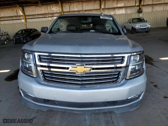 2018 Chevrolet Suburban Premier with VIN 1GNSCJKC7JR104888, listed as a Copart auction lot 68027604 with 69,632 mi miles and Salvage Title. Bid and sale history available at carsss.com. Image 5.