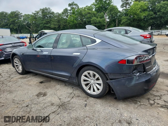 2017 Tesla Model S 60 z VIN 5YJSA1E18HF193461, wystawiony jako Copart lot #61040785 z przebiegiem 99 100 mil mil oraz Szkoda całkowita • Salvage title. Historia ofert i sprzedaży dostępna na DreamBid. Obrazek 2.