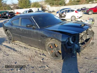 2006 Dodge Charger SRT-8 with VIN 2B3KA73W36H333944, listed as a IAAI auction lot 41339051 with 155,475 mi miles and . Bid and sale history available at carsss.com. Image 1.