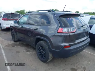 2023 Jeep Cherokee Altitude Lux with VIN 1C4PJMMB0PD115067, listed as a IAAI auction lot 42173993 with 52,180 mi miles. Bid and sale history available at carsss.com. Image 3.