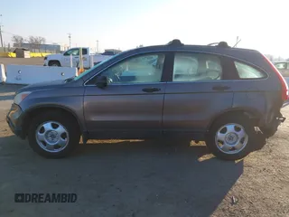 2009 Honda CR-V LX with VIN 5J6RE48389L011915, listed as a IAAI auction lot 41301796 with 214,807 mi miles. Bid and sale history available at carsss.com. Image 15.