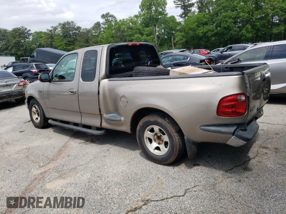 2003 Ford F-150 XL with VIN 1FTRX07213KD96765, listed as a Copart auction lot 53745465 with 292,863 mi miles and Salvage title. Bid and sale history available at DreamBid. Image 2.